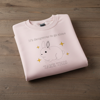 Load image into Gallery viewer, “It’s Dangerous to Go Alone” Bunny Women’s Sweatshirt